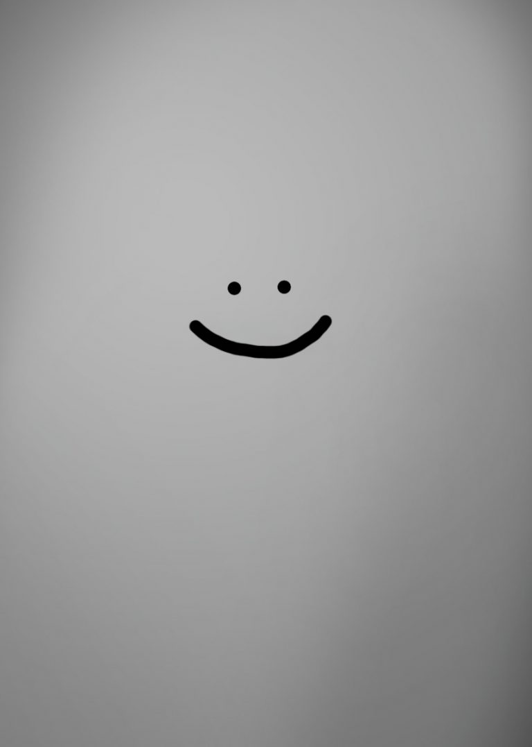 Smiley auf grauem Hintergrund
