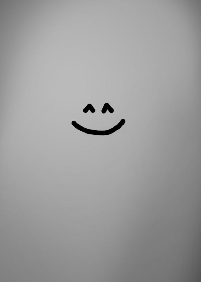 Smiley auf grauem Hintergrund